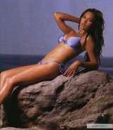 kinopoisk.ru-Tia-Carrere-31434.jpg