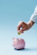 depositphotos_189908422-stock-photo-partial-view-man-putting-coin.jpg