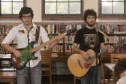 Flight of the Conchords Bret and Jermaine & Bellorus Bas Guitar.jpg